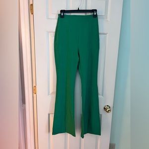 Green high waisted flare leg with front slit pants